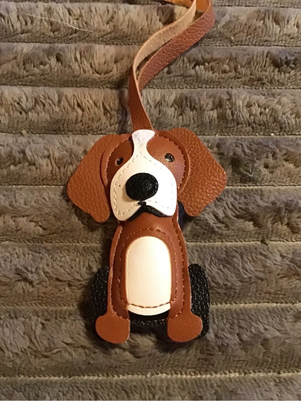 Brown and White Dog-Shaped Pet Tag or Accessory